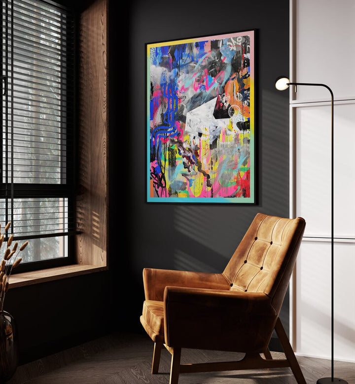 Abstra by Famous When Dead Pop Art Paintings Pop Art Prints in Black Plain Frame placed on a wall beside an orange sofa and a window