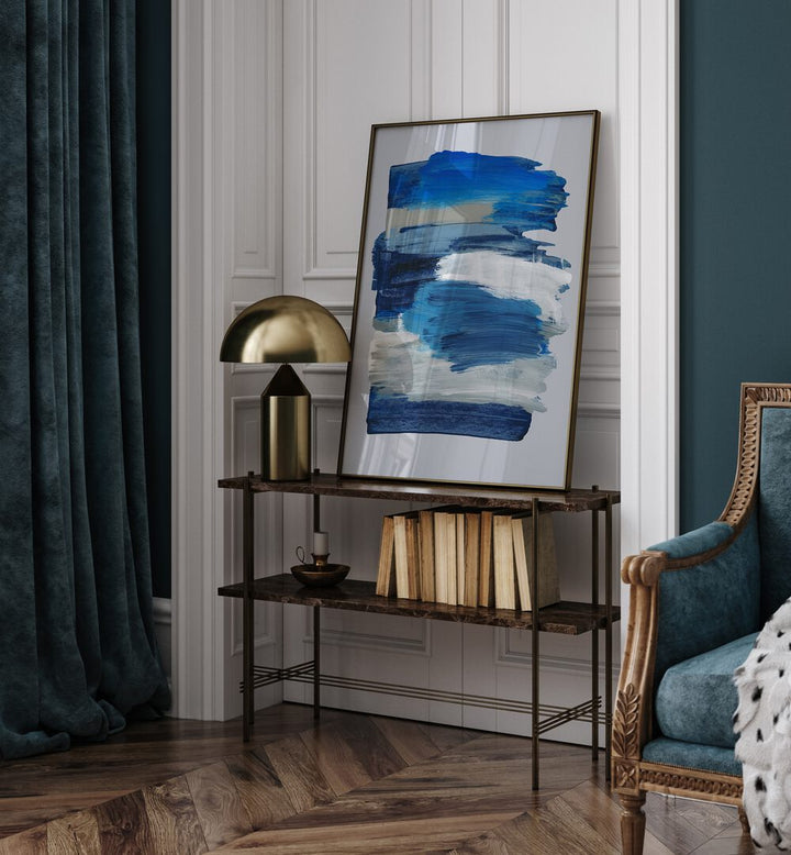 Abstract Brush Strokes Blue Mirage By Mareike Bohmer Abstract Art Abstract Paintings in Black Plain Frame placed on a Console Table in the Drawing Room