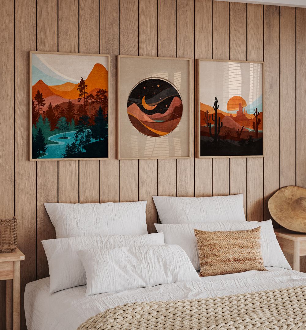 Abstract Landscape Set Of 3 Paintings in Oak Wood Plain Frame placed on a wall behind a bed in a bedroom