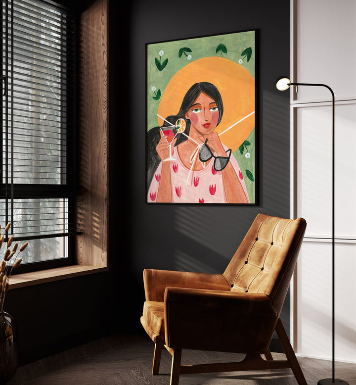 Abstract Modern Bohemian Woman With Cocktail By Caroline Bonne Muller Woman Illustration Paintings in Black Plain Frame on a wall beside an orange sofa