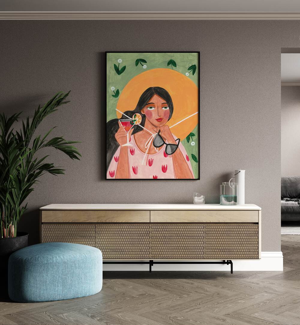 Abstract Modern Bohemian Woman With Cocktail By Caroline Bonne Muller Woman Illustration Paintings in Black Plain Frame on a wall above a console table