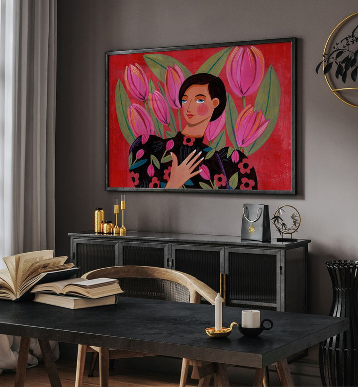 Abstract Modern Portrait Woman With Tulips By Caroline Bonne Muller Women Paintings in Black Plain Frame on a wall above  a console table behind a table