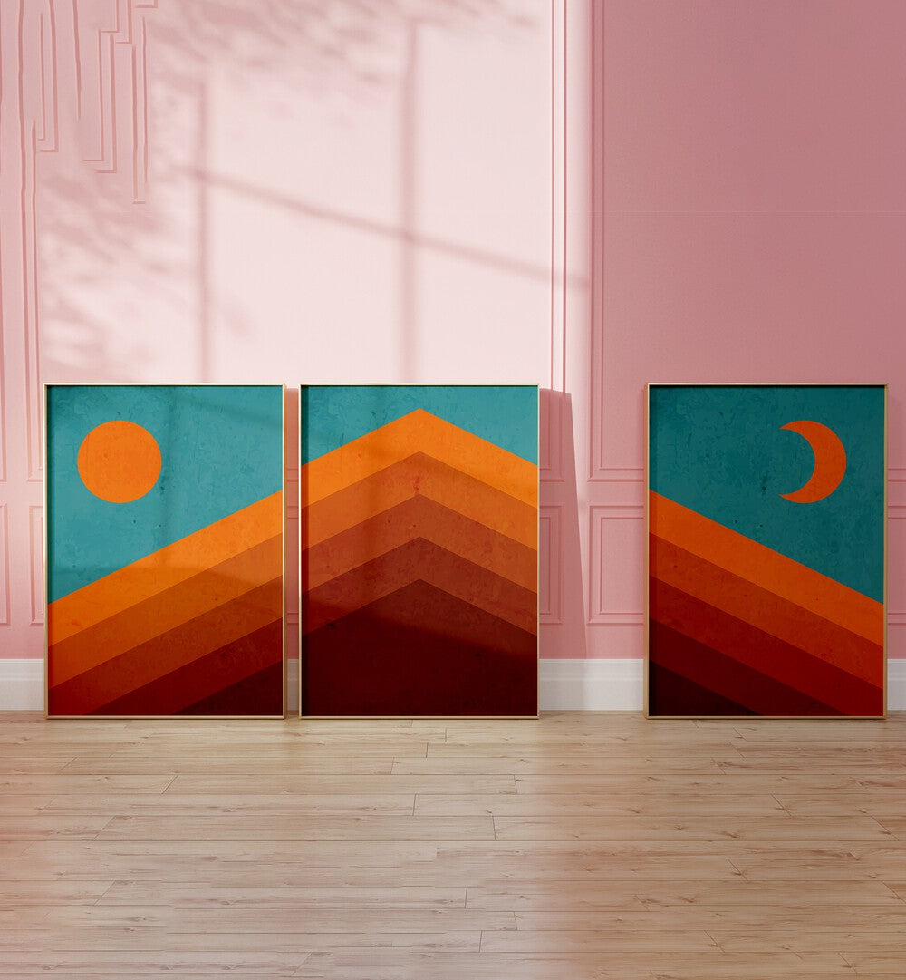 Abstract Mountain Sunrise Set Of 3 Paintings in Oak Wood Plain Frame placed on the floor