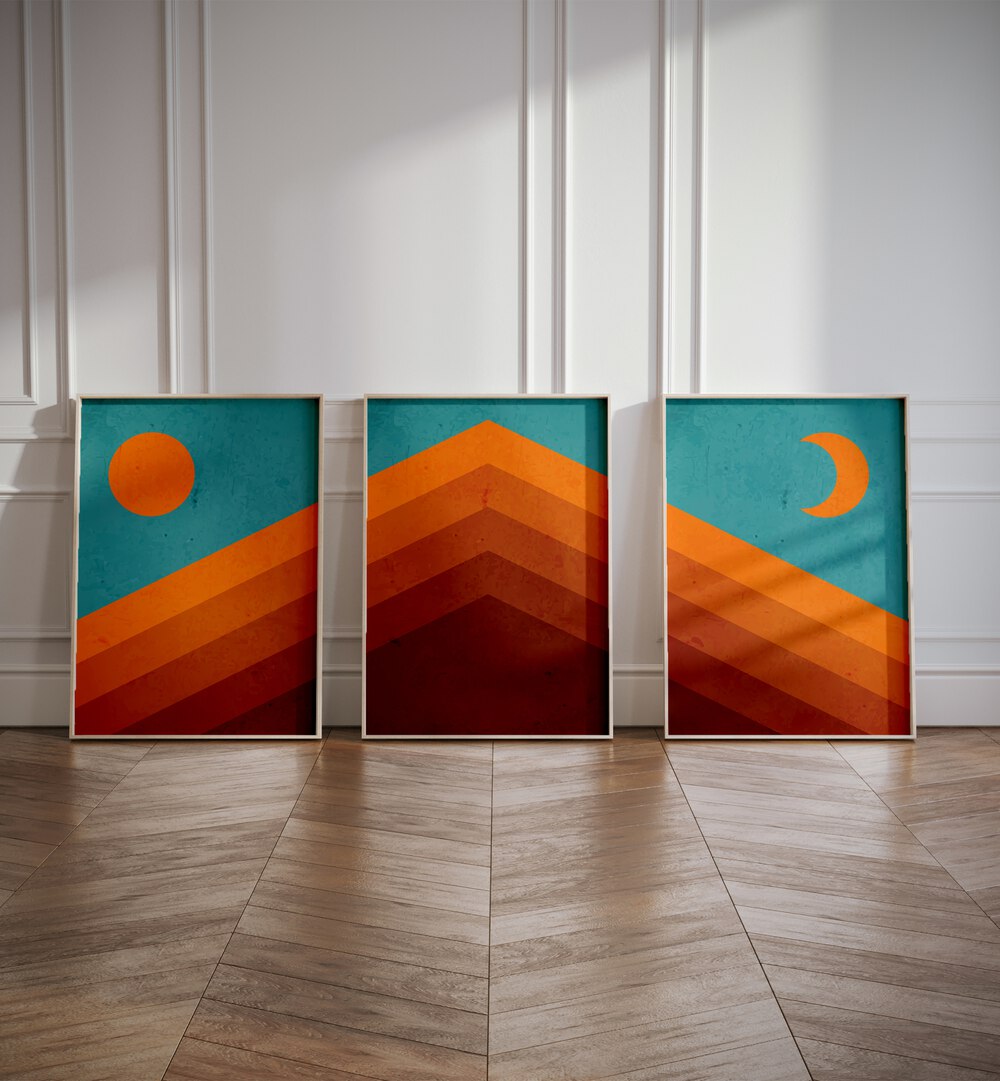 Abstract Mountain Sunrise Set Of 3 Paintings in Oak Wood Plain Frame placed on the floor