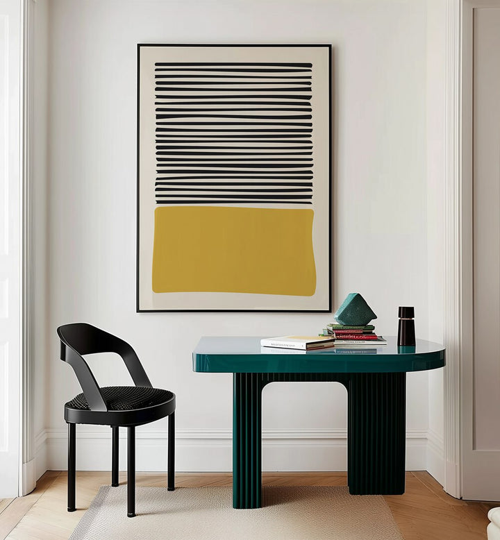 Abstract Yellow Abstract Paintings Abstract Art Prints in Black Plain Frame placed on a Cream Colored Wall near a Table in a Workspace in the Drawing Room