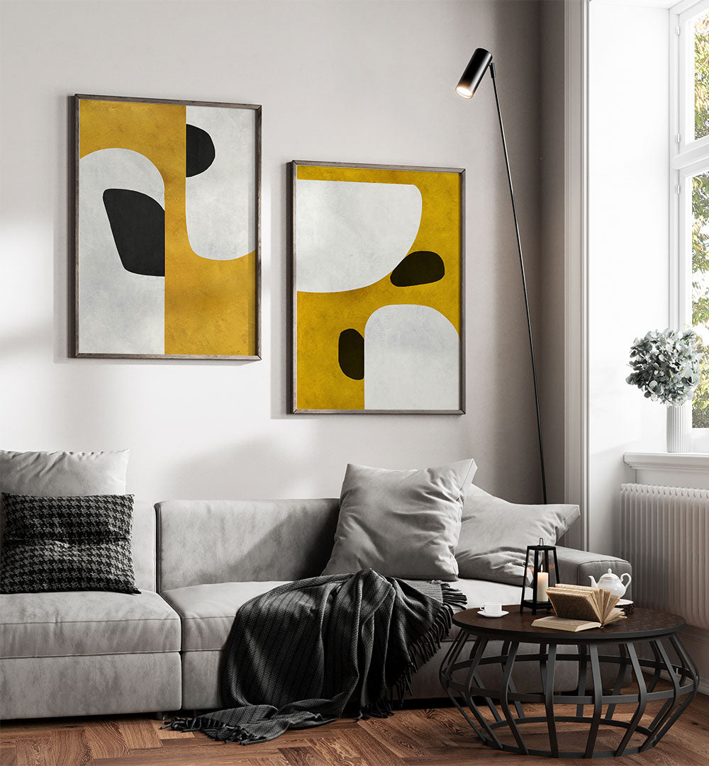 Modern living room with abstract art, gray sofa, and coffee table.