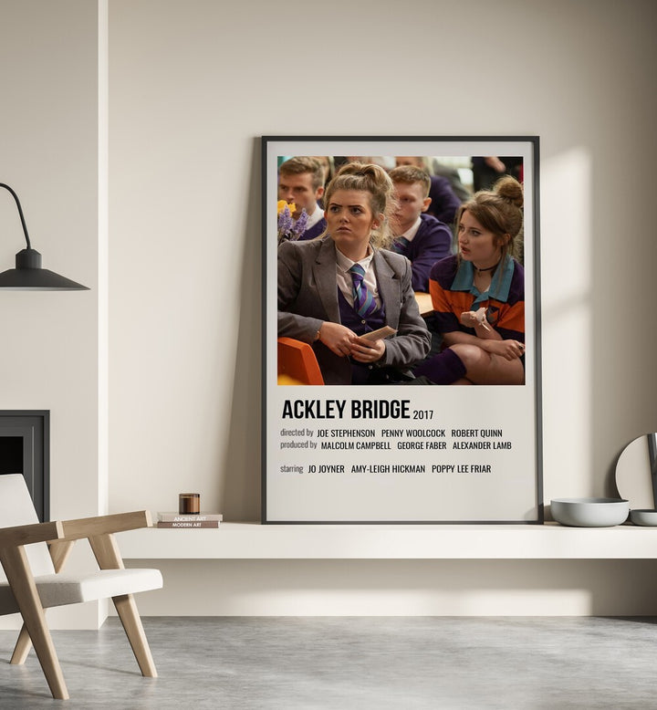 Ackley Bridge 2017 Movie Posters in Black Plain Frame place on a wall behind a chair beside lamp