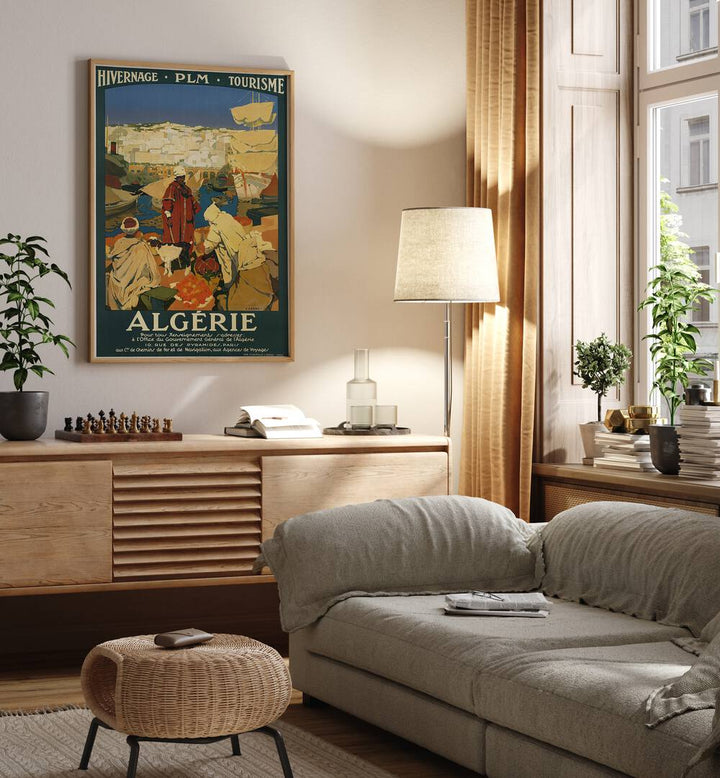 Algerie  Vintage Travel Posters in Oak Wood Plain Frame placed on a wall behind a console table