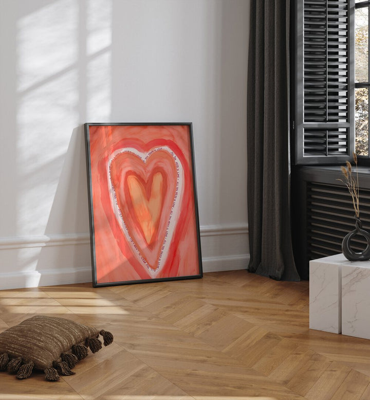 All You Need Is Love By Treechild Wall Art Prints in Black Plain Frame placed on the floor near a White Colored Wall in the Living Room