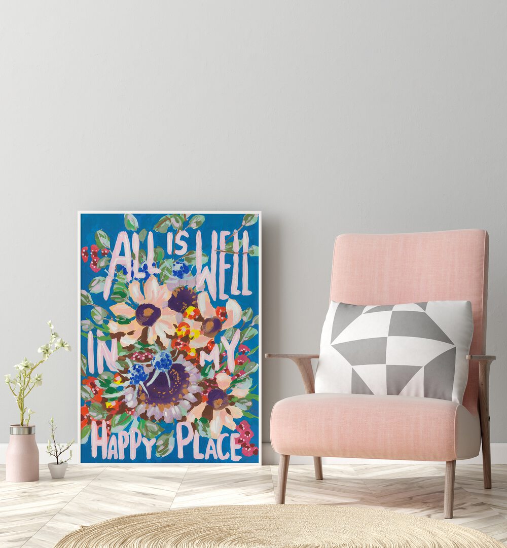 All is Well by Ania Zwara Quotes and Typography Posters in White Plain Frame placed on the floor beside a chair