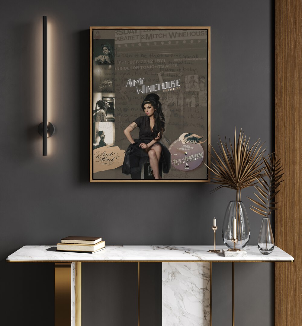 Amy Winehouse By Grishma Korjani Movie and Music Posters in Oak Wood Floater Frame placed on a Dark Grey Colored Wall above a Shelf