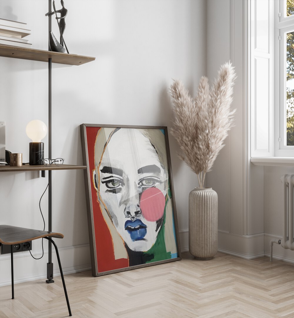 Ana Sneeringer Mayra Seems By Ana Sneeringer Women Illustration Paintings in Dark Wood Plain Frame placed on a floor beside an artificial plant