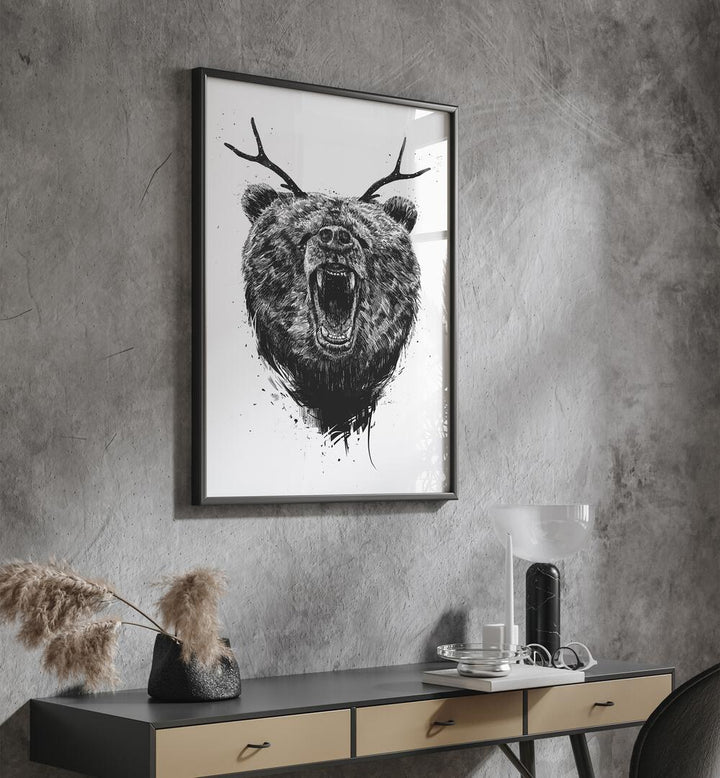 Angry Bear With Antlers By Balazs Solti Wildlife Art Prints in Black Plain Frame placed on a Dark Grey Colored Wall above a Console Table in the Drawing Room