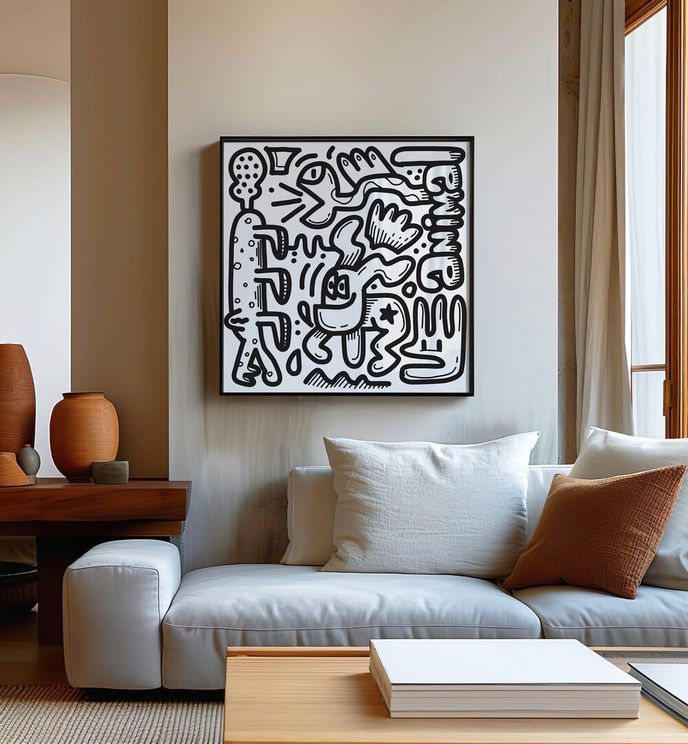 Animal Doodle Doodle Art Painting in Black Plain Frame placed on wall behind a white sofa