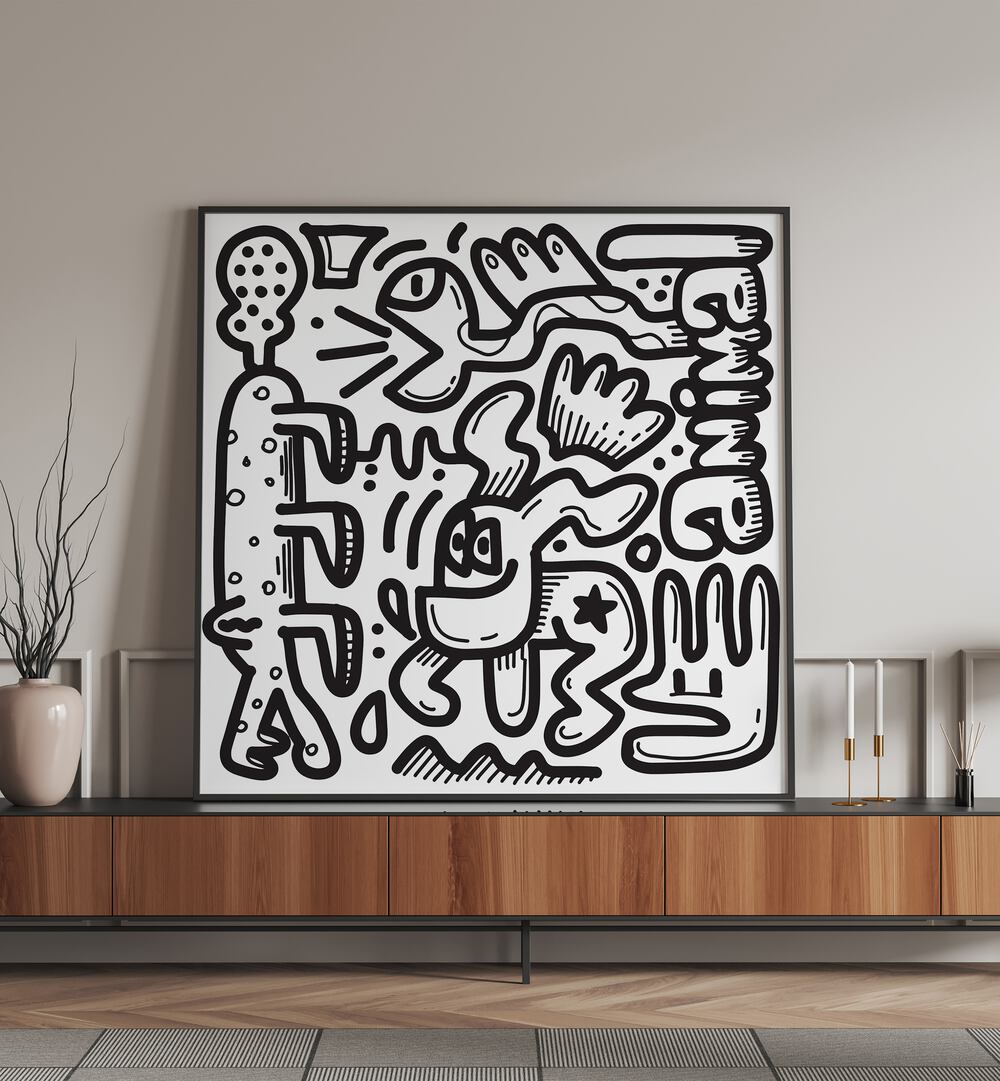 Animal Doodle Doodle Art Painting in Black Plain Frame placed on a black table