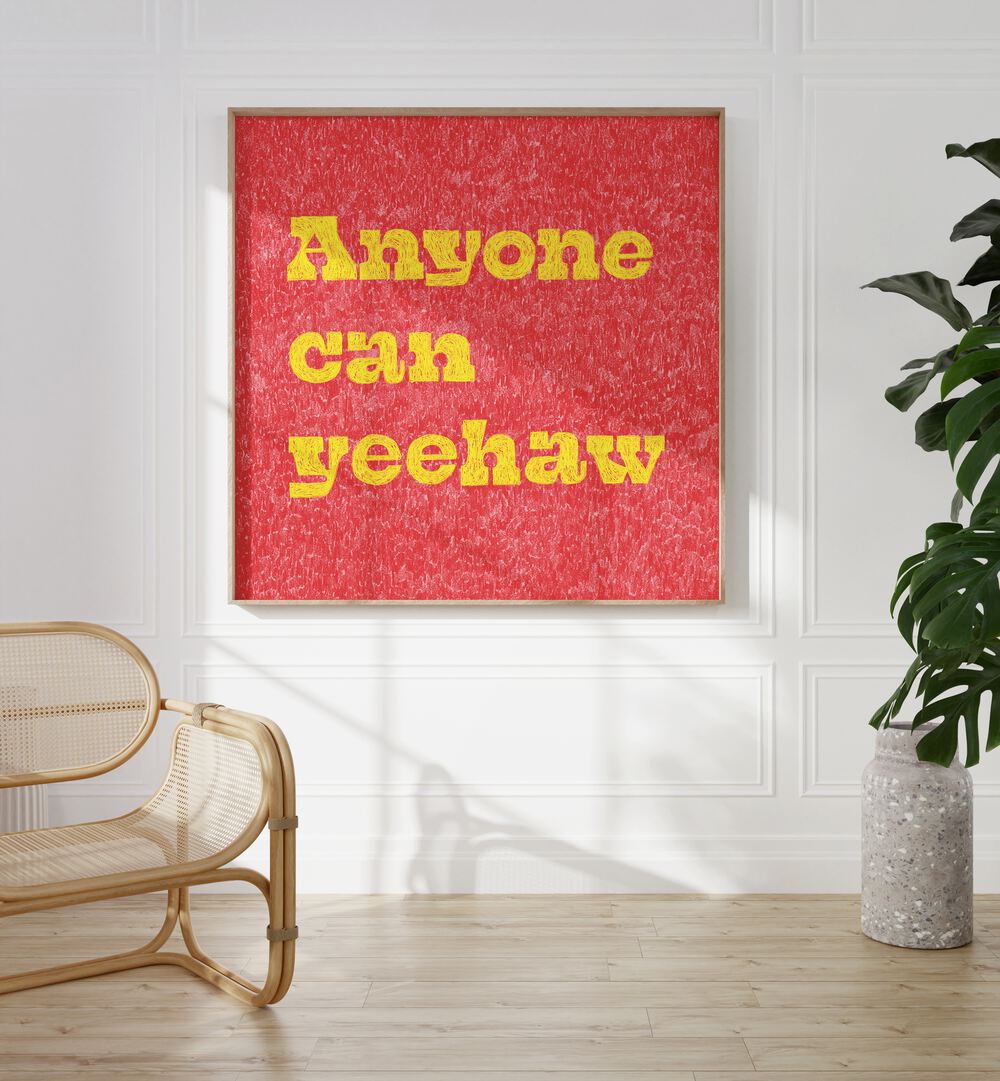 Anyone Can Yeehaw Quotes And Typography Posters in Oak Wood Plain Frame placed on a White Colored Wall in the Drawing Room