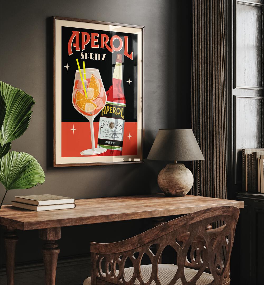 Aperol Spritz Black Cafe Art Prints Cafe Posters in Dark Wood Plain Frame placed on a wall behind a study table and beside a window