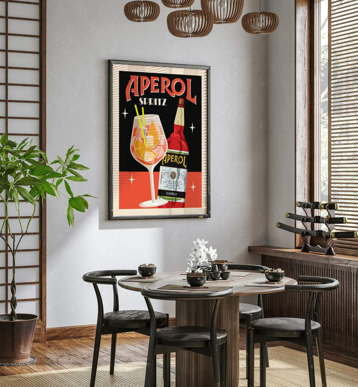 Aperol Spritz Black Cafe Art Prints Cafe Posters in Black Plain Frame placed on a wall behind a dining table and beside a window for dining area