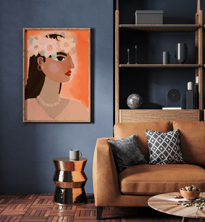 Aphrodite By Treechild Women Illustrations Paintings in Oak Wood Plain Frame placed on a Blue Colored Wall near a Brown Sofa in the Living Room