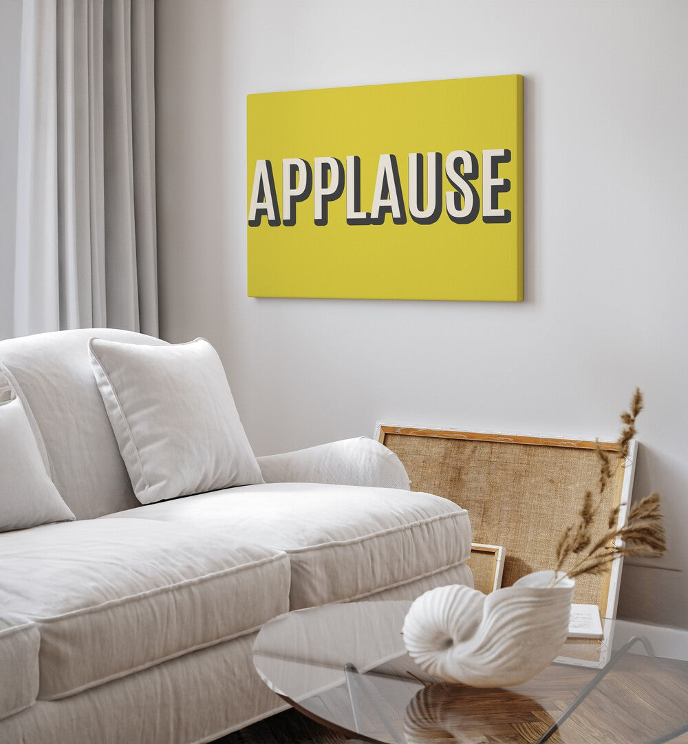 Bright yellow APPLAUSE wall art poster showcasing inspiring APPLAUSE, QUOTES for creative home decor.