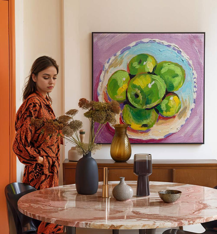 Apples By Key And Sea Creative Bar and Cafe Artwork in Black Plain Frame behind a dining table on a white wall