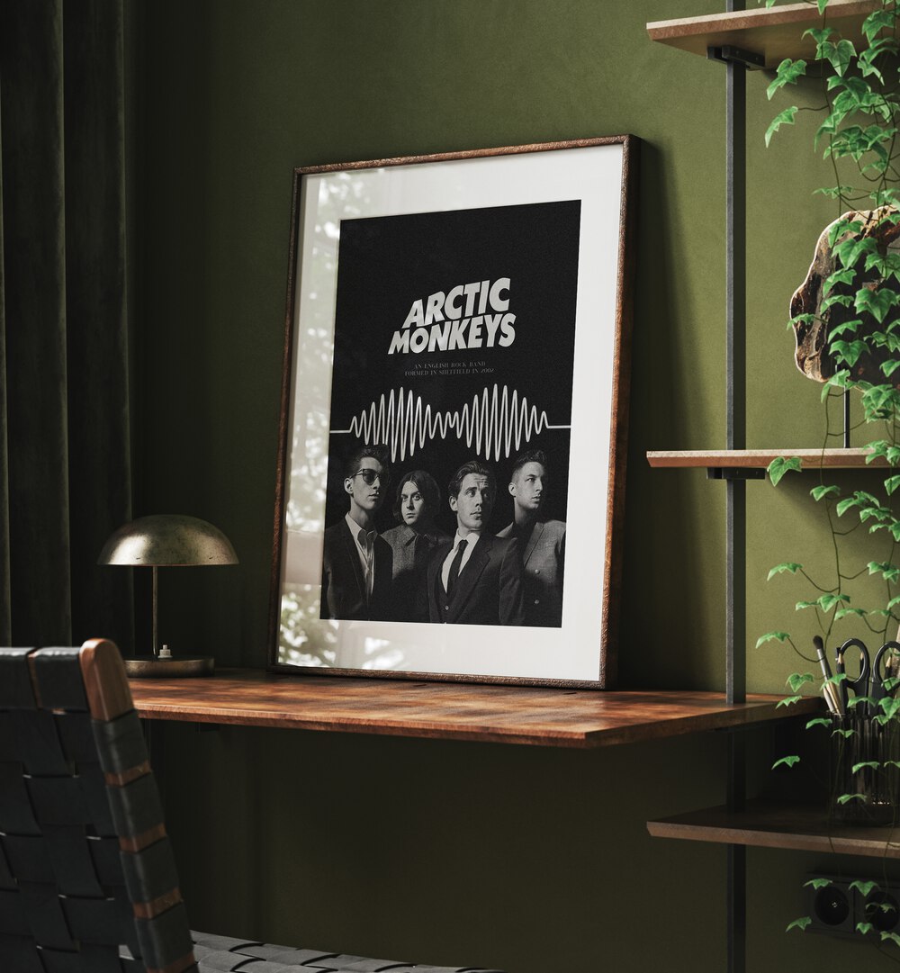 Arctic Monkeys By Grishma Korjani Movie Posters in Oak Wood Frame With Mountplaced on a Shelf near a Green Colored Wall