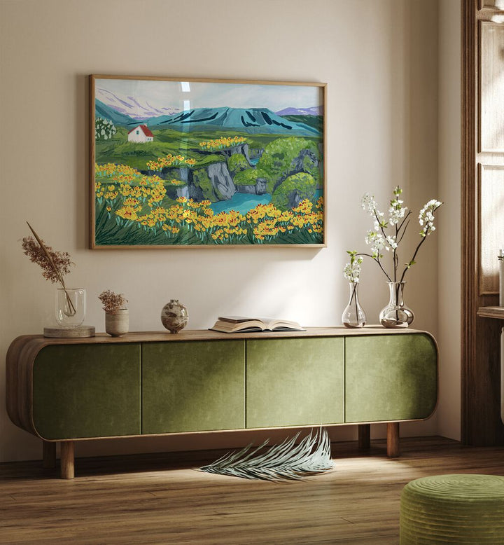 Arnarstapi By Sarah Gesek Landscape Art Prints in Oak Wood Plain Frame placed on a wall behind a console table