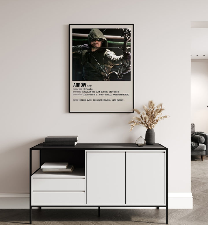 Arrow 2012 Movie Posters in Black Plain Frame hanging on wall above console table