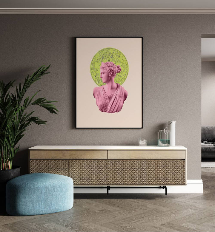 Artemis Neon Zodiac By Grace Digital Art Co Altered Art Prints in Black Plain Frame placed on a wall behind a console table and beside a plant