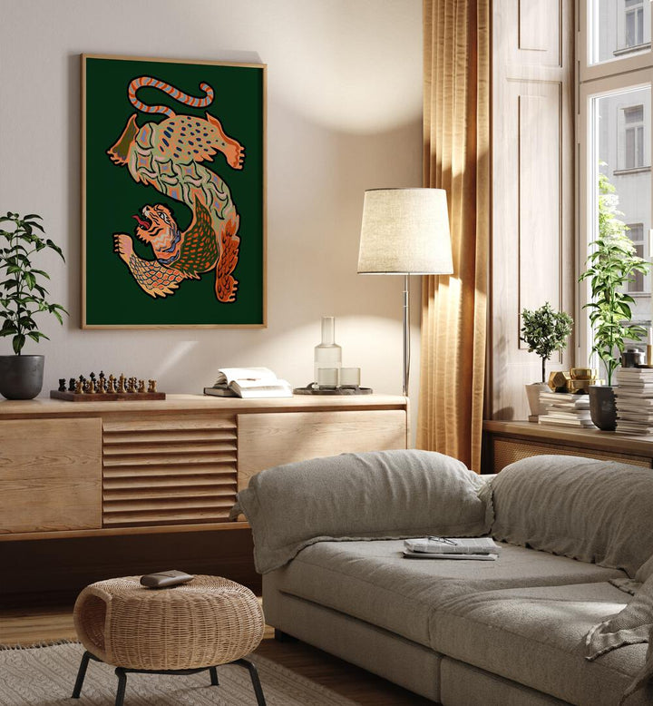 Asian Tiger Green By Arty Guava Wall Art Prints in Oak Wood Plain Frame placed on a Cream Colored Wall above a Console Table near a Grey Sofa in the Living Room