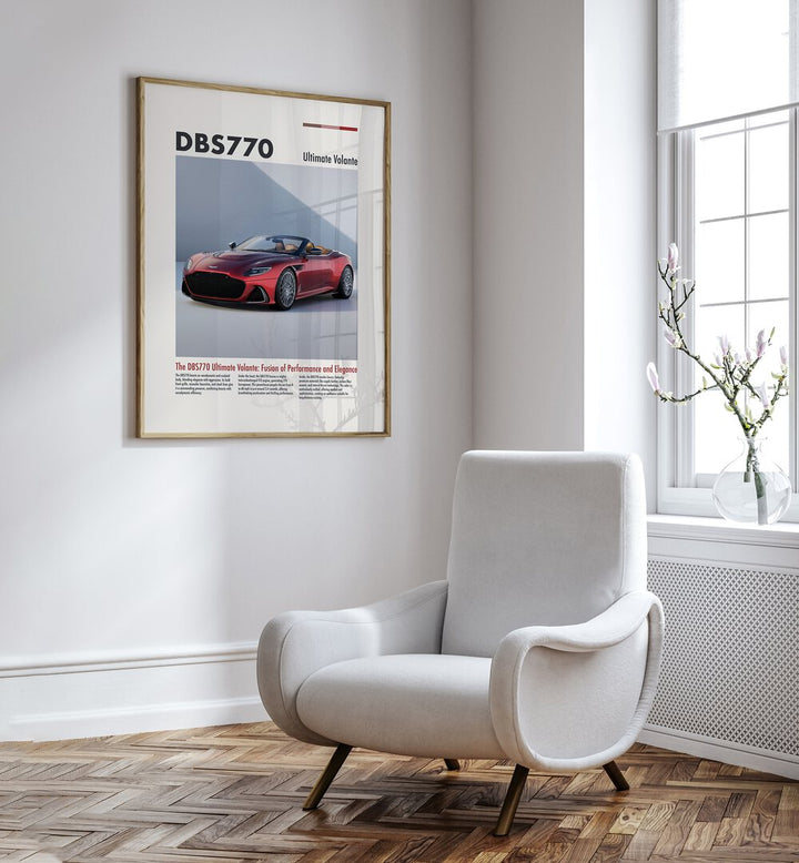 Aston Martin DBS 770 Car Posters Automotive Wall Art Prints in Oak Wood Plain Frame placed on a White Colored Wall near a White Sofa Chair in the Drawing Room