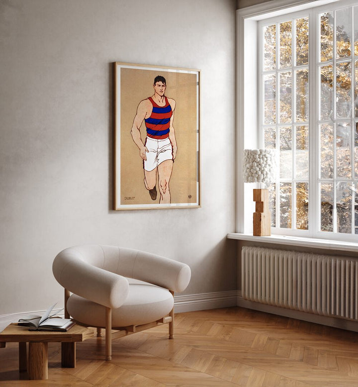 Athlete Ca. 1908 Vintage Paintings in Oak Wood Plain Frame placed on the wall beside a window and a chair