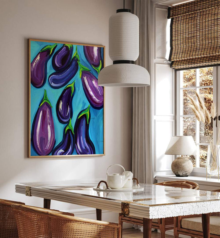 Aubergines Rain by Alice Straker Kitchen Posters Kitchen Art Prints in Oak Wood Plain Frame placed on a wall in a dining room area beside a window and behind a dining table