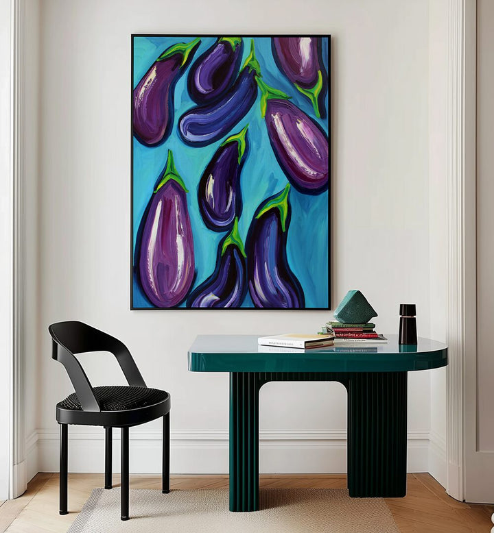 Aubergines Rain by Alice Straker Kitchen Posters Kitchen Art Prints in Black Plain Frame placed on a wall behind a study table