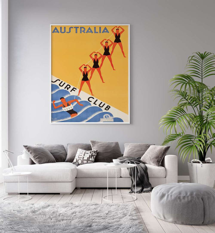 Australia Surf Club  Retro Travel Posters in White Plain Frame placed on a wall behind a sofa