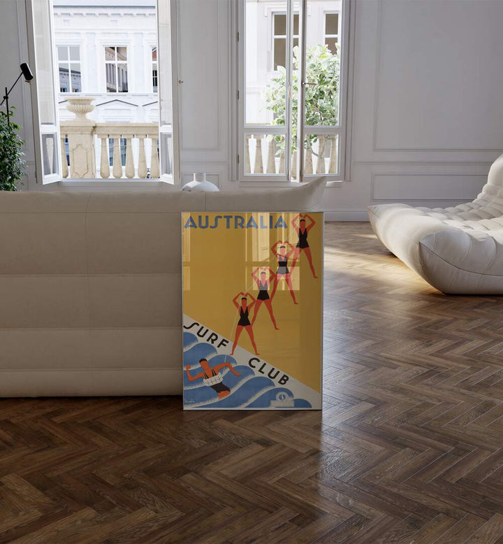 Australia Surf Club  Retro Travel Posters in White Plain Frame placed on a floor beside a sofa