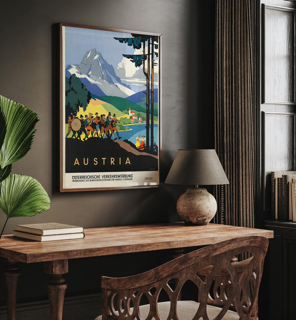 Austria Retro Vintage Travel Travel Posters in Dark Wood Plain Frame on a wall above a study table beside a lamp