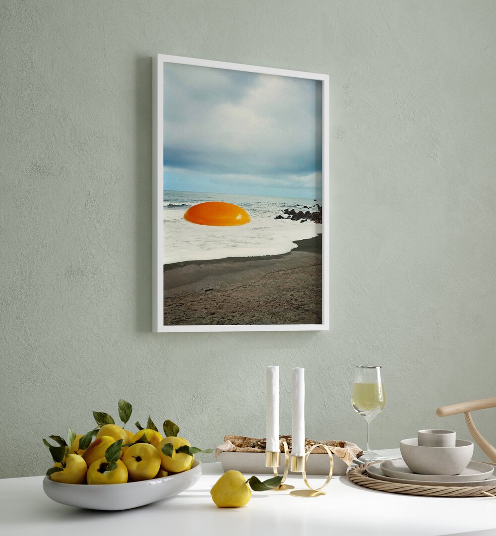 Beach Egg - Sunny Side Up Surreal Painting, Surreal Art Artwork in White Plain Frame placed on a Sage green Wall near a Dining Table in the Dining Room