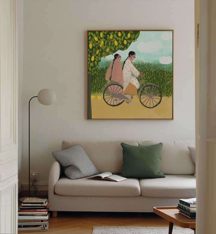 Bicycle Ride By Shreya Roy Chowdary, Indian Art Paintings Artwork in Oak Wood Floater Frame placed on a Cream Colored Wall near a Beige Sofa in the Living Room