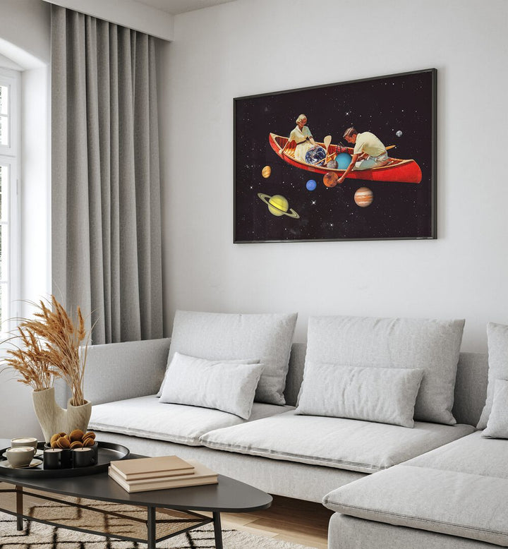 Big Bang Generation Surreal Art Painting Artwork in plain black frame behind a sofa on a white wall