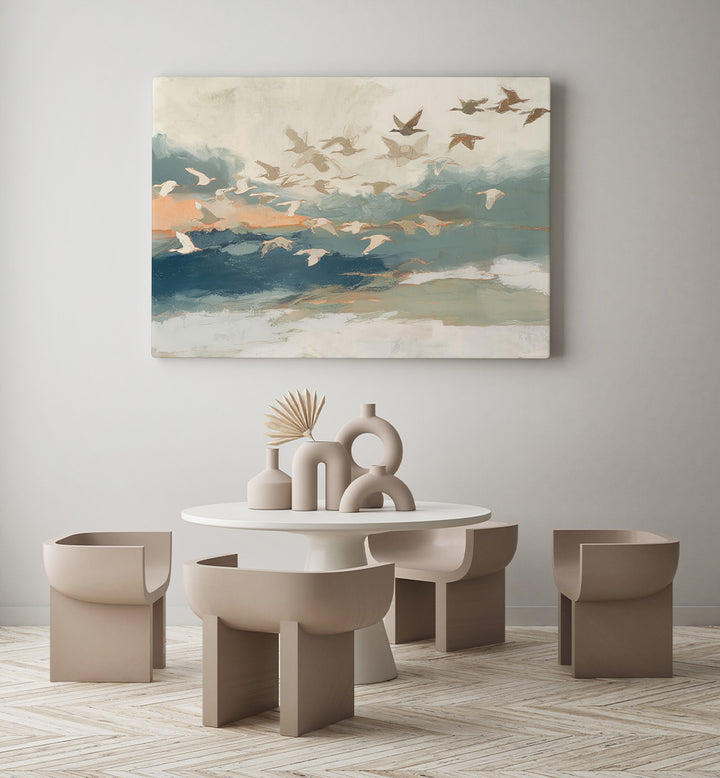 BIRDS IN FLIGHT AT DUSK OVER OPEN WATER