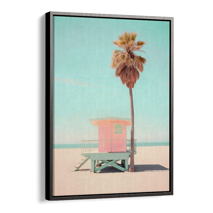 BEACHSIDE PINK BLISS, BEACH PAINTINGS showcasing a vibrant lifeguard station and palm tree against a serene beach backdrop.