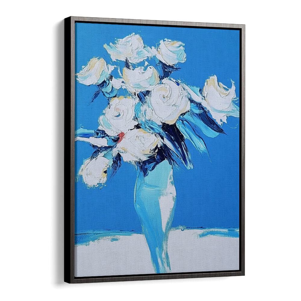 Elegant white roses in a blue vase, perfect for enhancing home decor with charm and style. Ideal centerpiece for any room.
