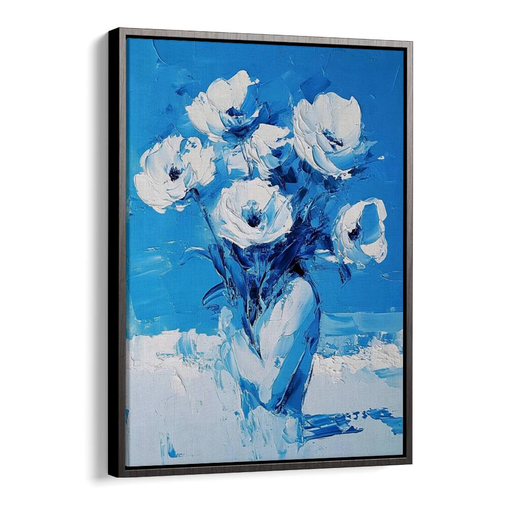 Stunning BLUE FLOWERS in a vibrant blue vase, perfect for home decor and adding elegance to any space.