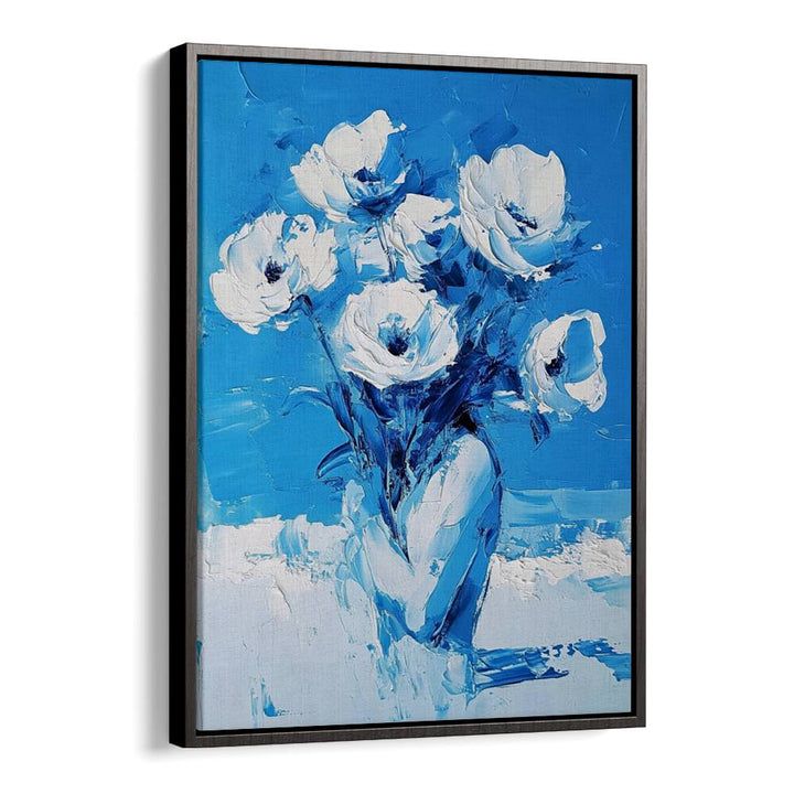 Stunning BLUE FLOWERS in a vibrant blue vase, perfect for home decor and adding elegance to any space.