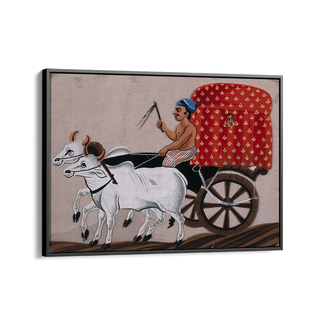 A MAN DRIVING A BULLOCK