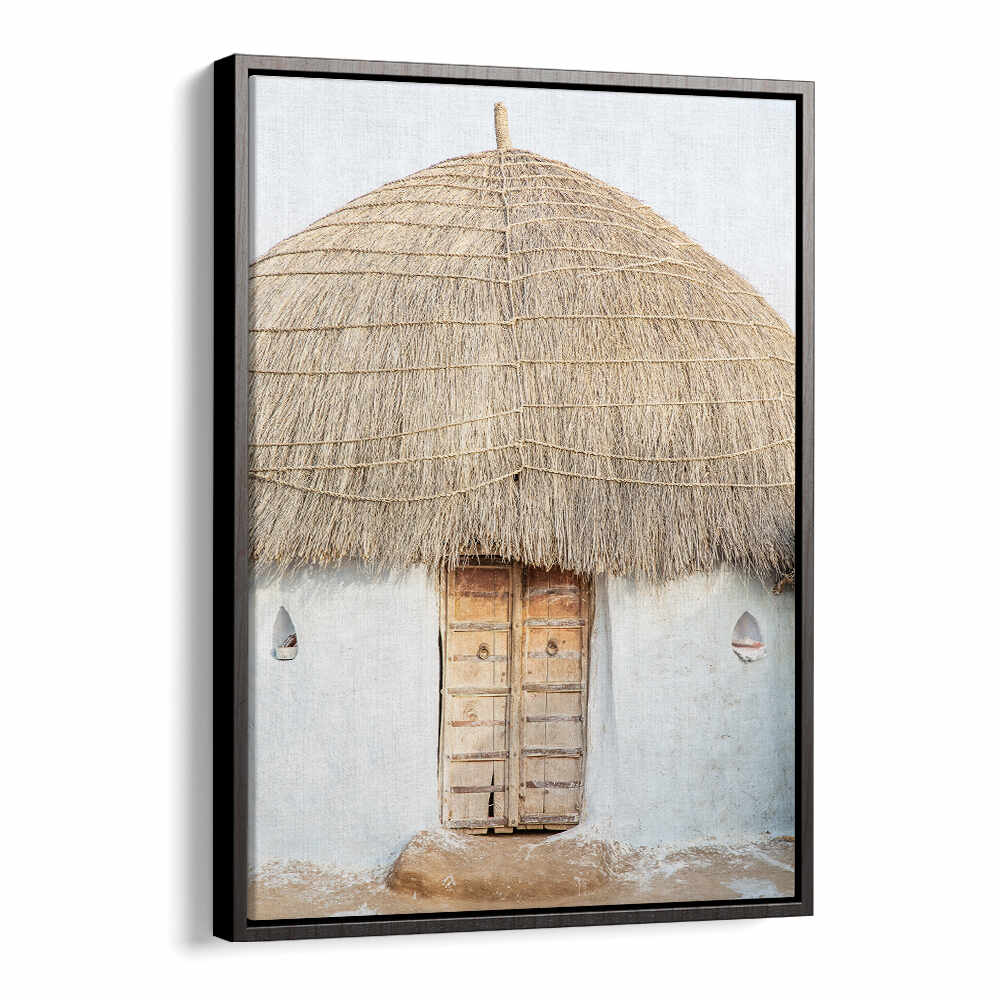 BLACKFLOATER framed rustic hut with large thatched roof and wooden door — THATCHED HAVEN , INDIAN ART PAINTINGS