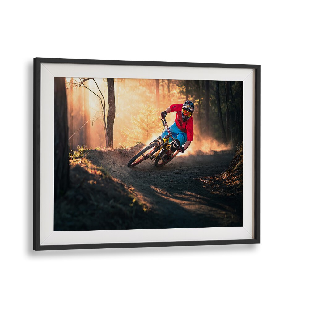Dynamic photograph of a cyclist on a wooded trail, featuring GOLDEN BERMED CORNER, PHOTOGRAPHY PRINTS for art lovers.