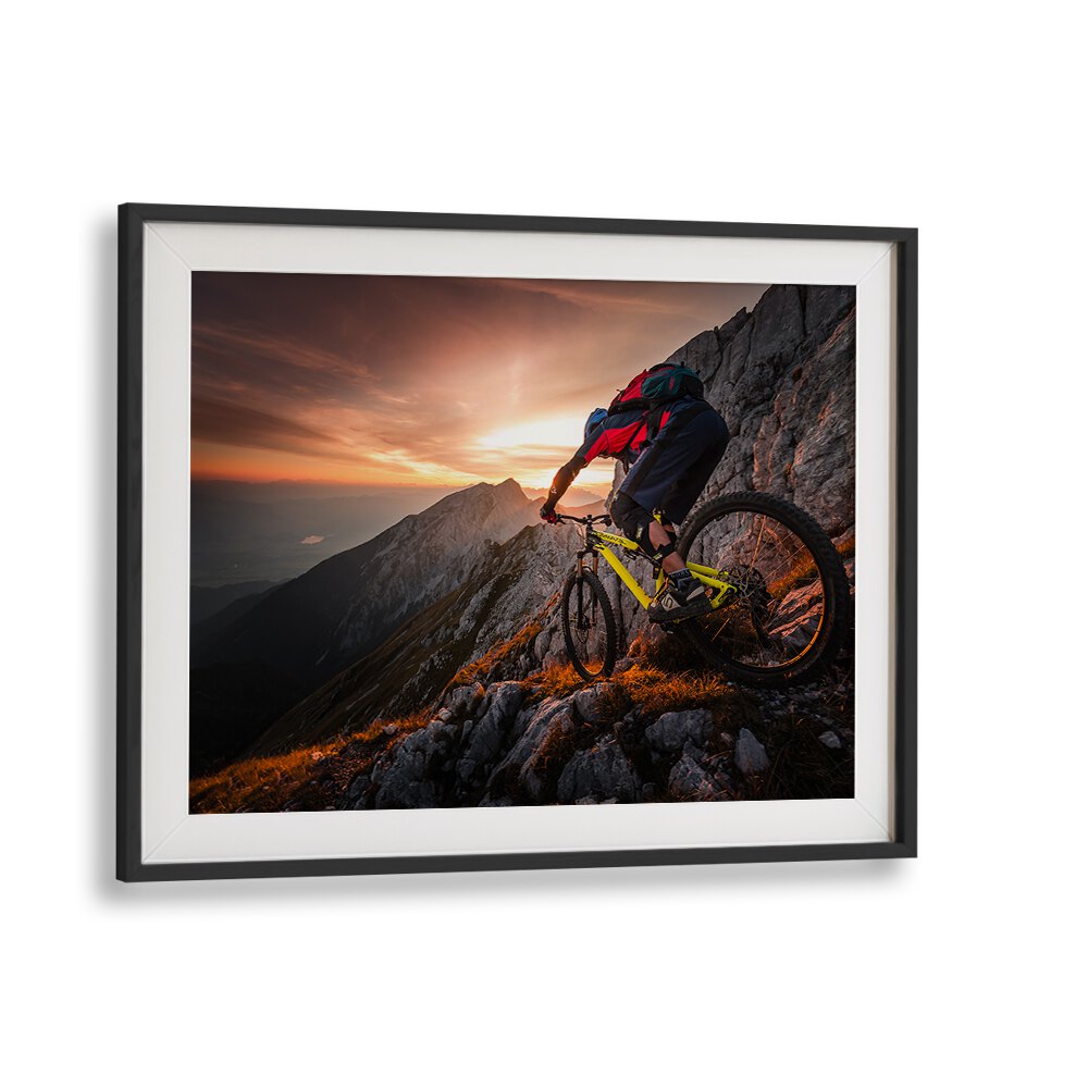 Mountain biker conquering rocky terrain at sunset in GOLDEN HOUR HIGH ALPINE RIDE, PHOTOGRAPHY PRINTS. Perfect for your decor!