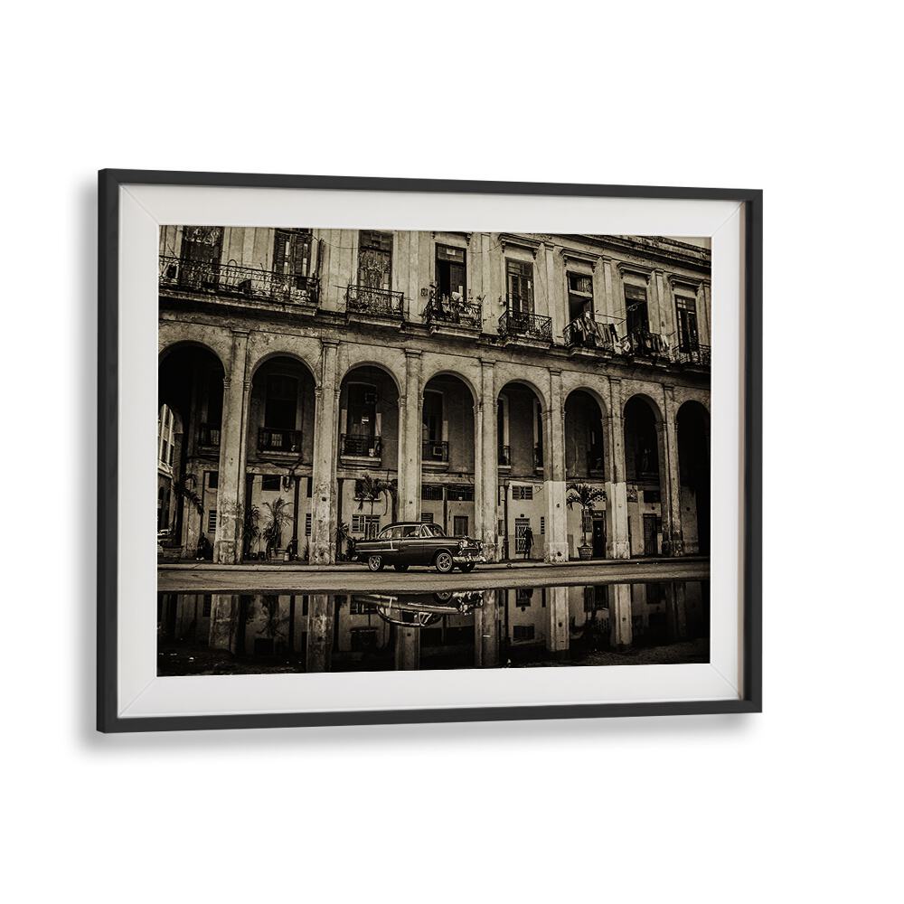 Explore urban elegance with HABANA STREET VIII, PHOTOGRAPHY PRINTS, showcasing iconic architecture and vintage cars.